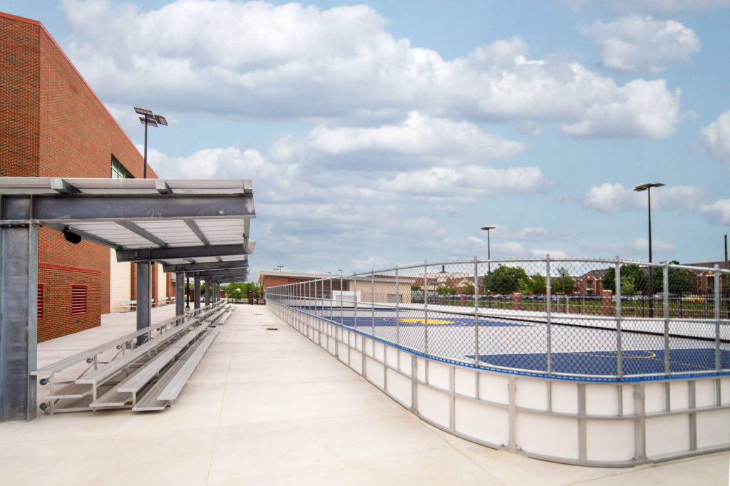 Texas A&M University Commerce Mac Court Addition Texas A&M University Commerce Texas Mac Court addition side view of the fenced sport court with the public address system sound system and video capabilities