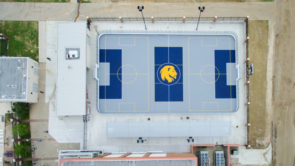 Texas A&M University Commerce Texas Mac Court sports court flooring is a polymer tile has dasher boards and rink dividers