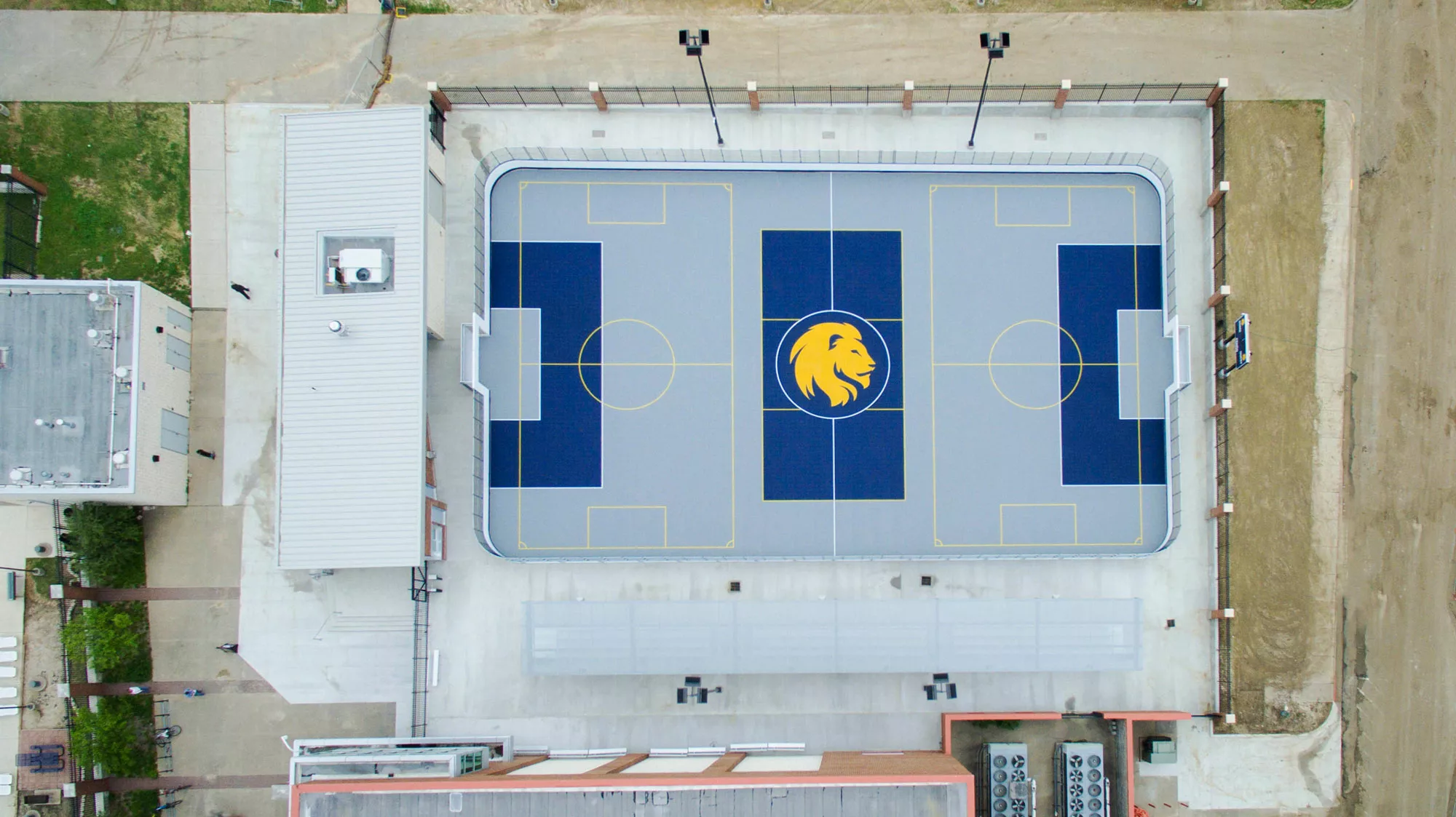 Texas A&M University-Commerce, Texas Mac Court sports court flooring is a polymer tile, has dasher boards and rink dividers completed using our construction manager at risk delivery method.