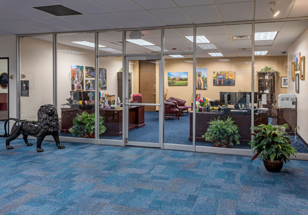 Completed Texas A&M University Commerce commercial renovation Completed Texas A&M University Commerce commercial renovation showing glassed entrance to business office area with desks